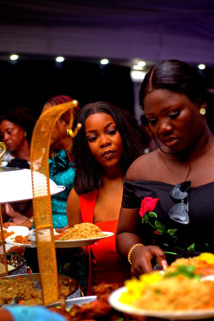 Guests at an evening buffet